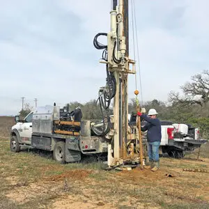 Hollow stem auger drilling used during environmental and geotechnical subsurface investigations.